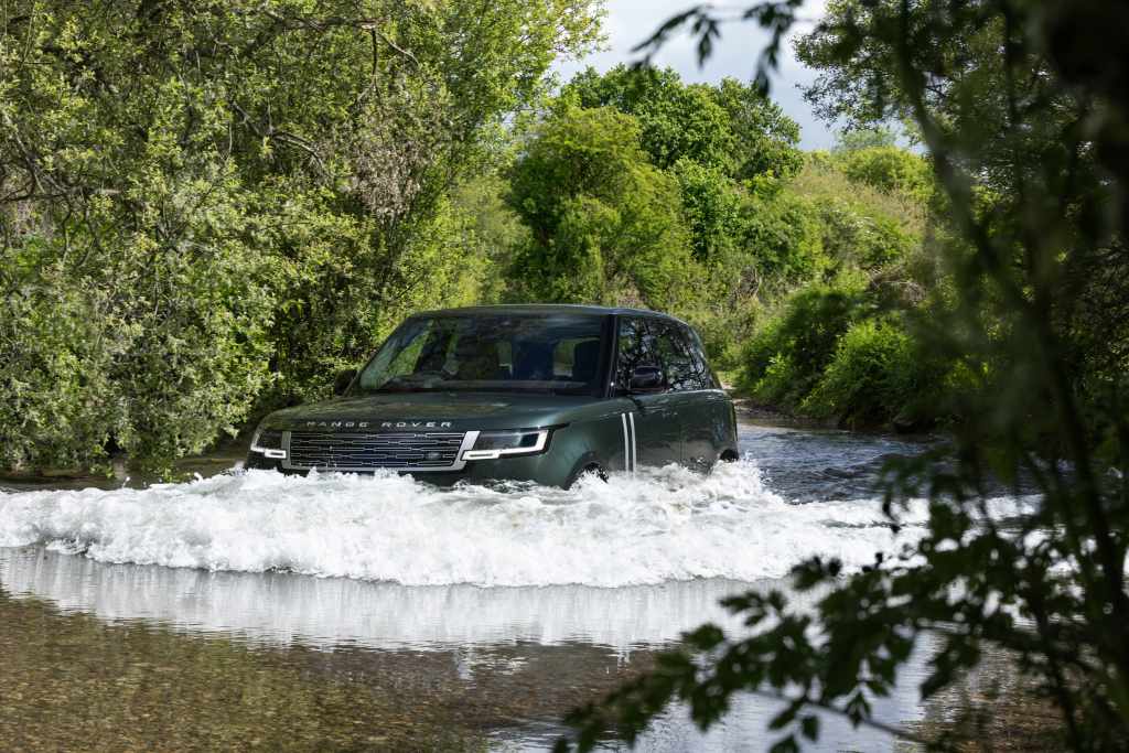 2027 Range Rover Electric wading through water