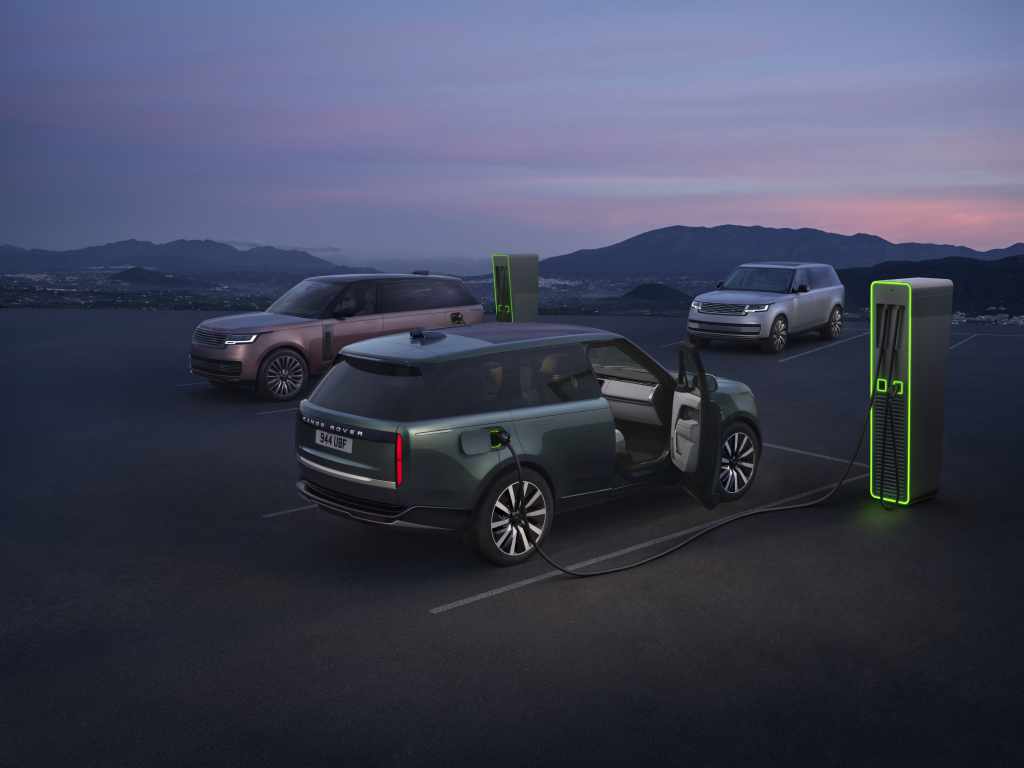 2027 Range Rover Electric plugged in at a public fast charger at Land Rover Solon in Solon, OH