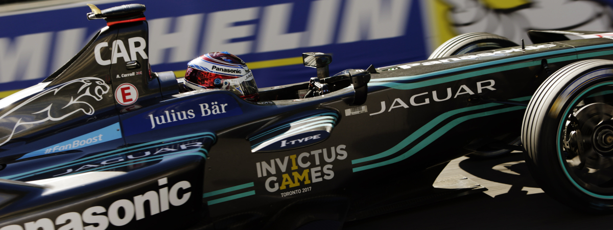 Tye Sheridan, Nicholas Hoult and Panasonic Jaguar Racing driver Mitch Evans on the grid at the Montreal ePrix
