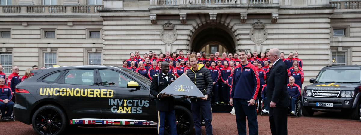 Prince Harry presents the Invictus Games Flag to US Team Captain Will Reynolds ahead of Orlando 2016