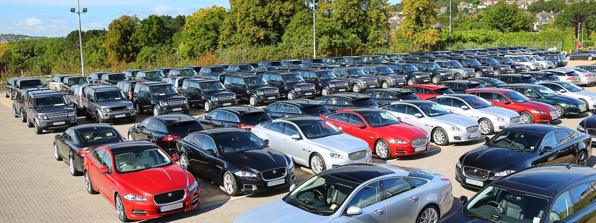 A fleet of Jaguar and Land Rover vehicles stand ready