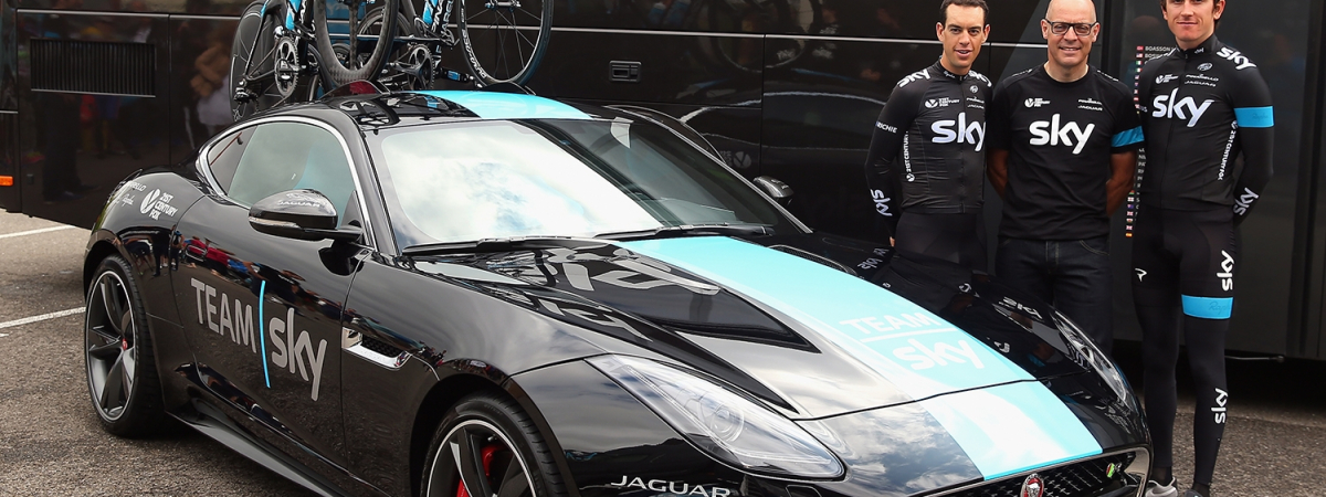 Team Sky’s Sir Dave Brailsford, Richie Porte and Geraint Thomas pose next to the new Jaguar F-TYPE Coupé high performance support vehicle