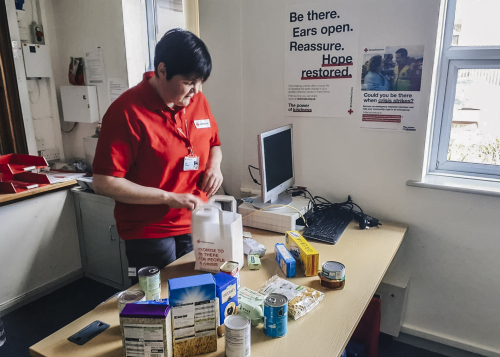 British Red Cross Volunteers from Bristol use Land Rover Defenders to deliver support packages for those in need